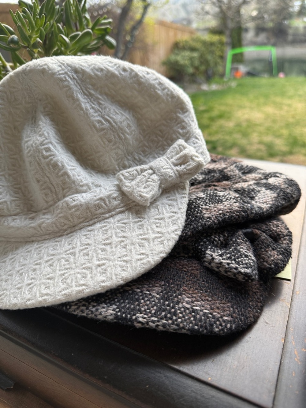 Pair of Textured Newsboy Caps with Bows. Cream one and brown plaid